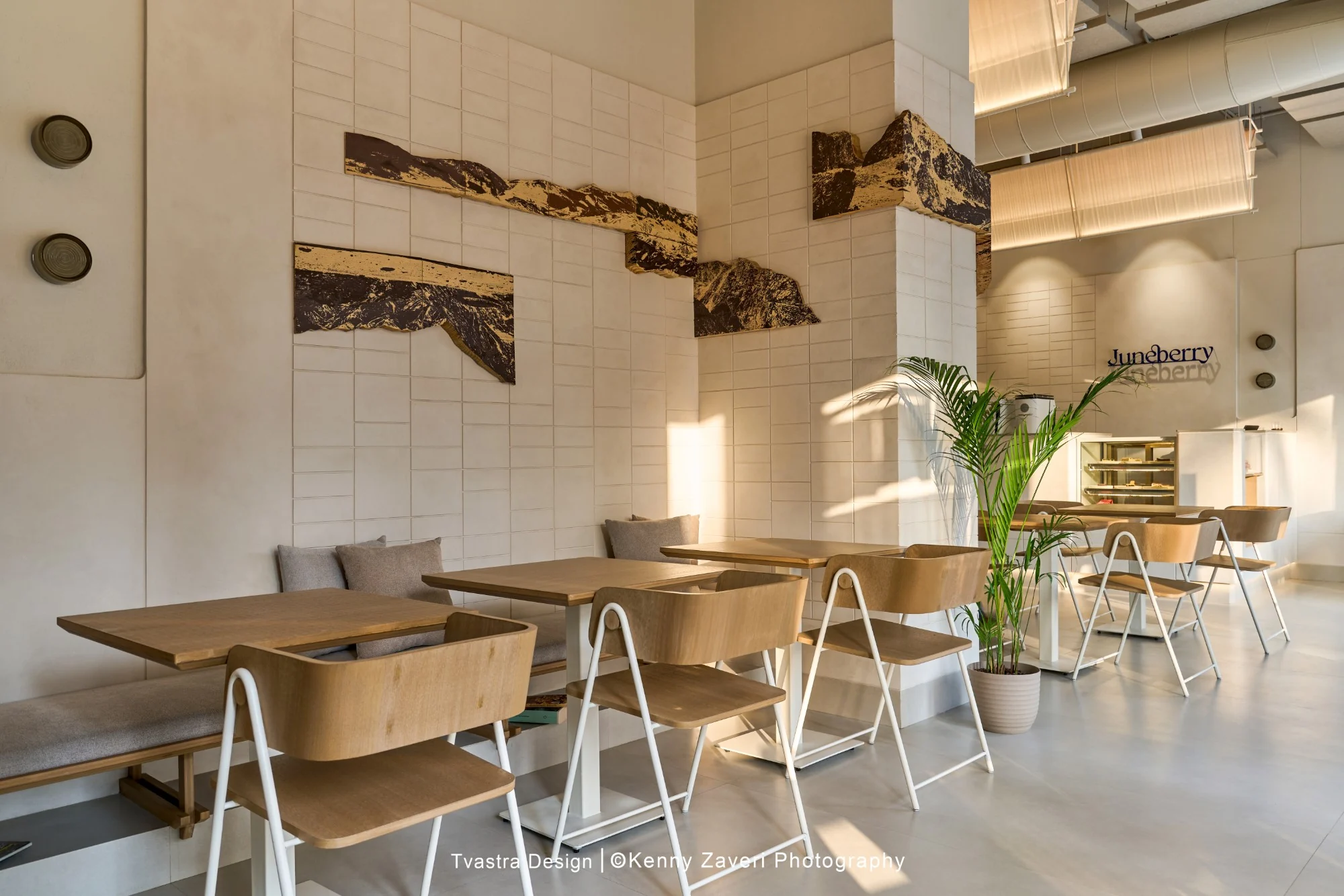 Juneberry, wood-waste installation evoking mountain ranges above the banquette