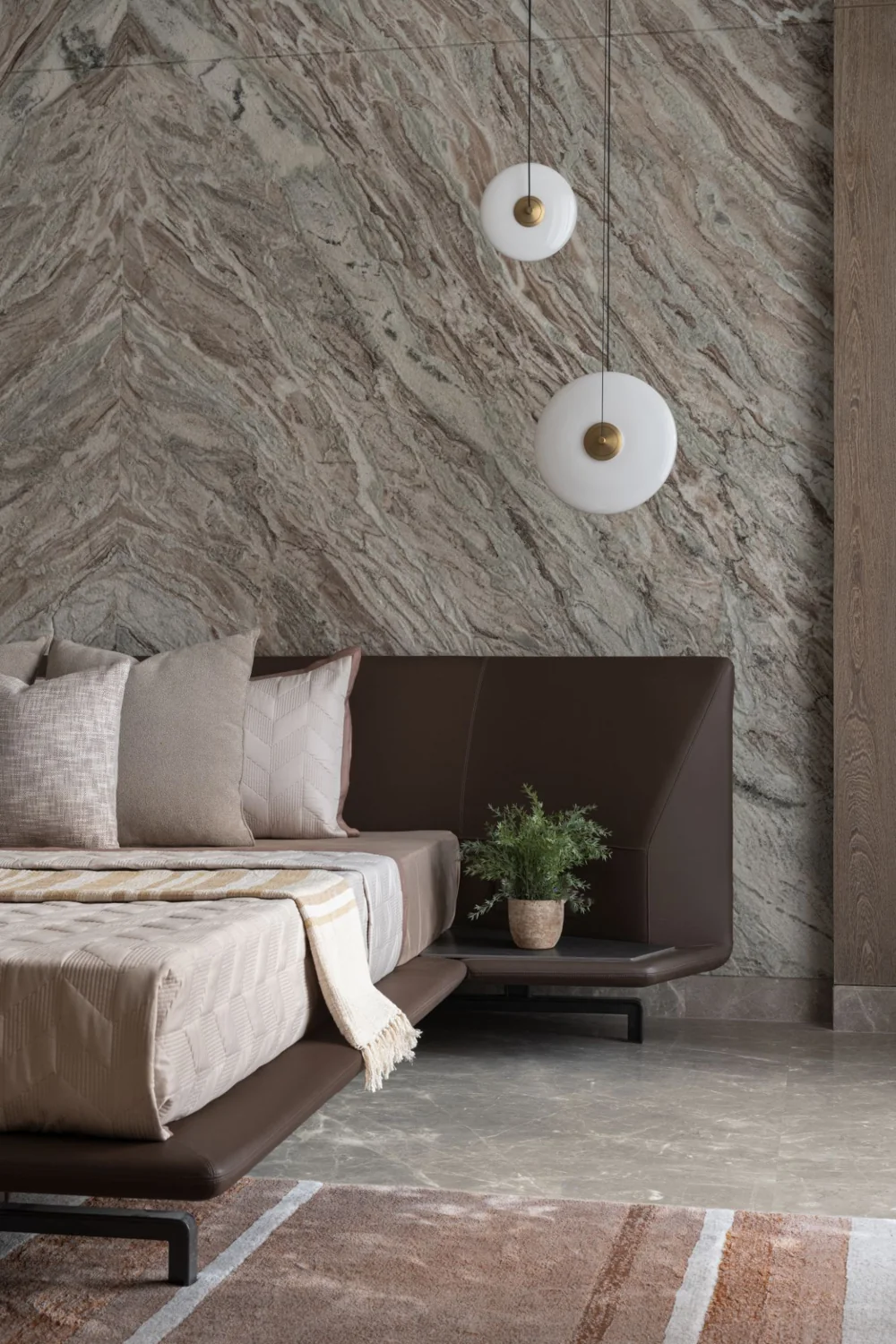 Pyramid Palacia, master bedroom with a book-matched marble feature wall